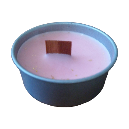 Coconut soy wax candles in metal containers, presented in a variety of colors, including pink, red, yellow, and white, purple.