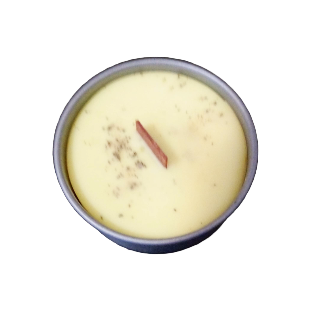 Coconut soy wax candles in metal containers, presented in a variety of colors, including pink, red, yellow, and white, purple.